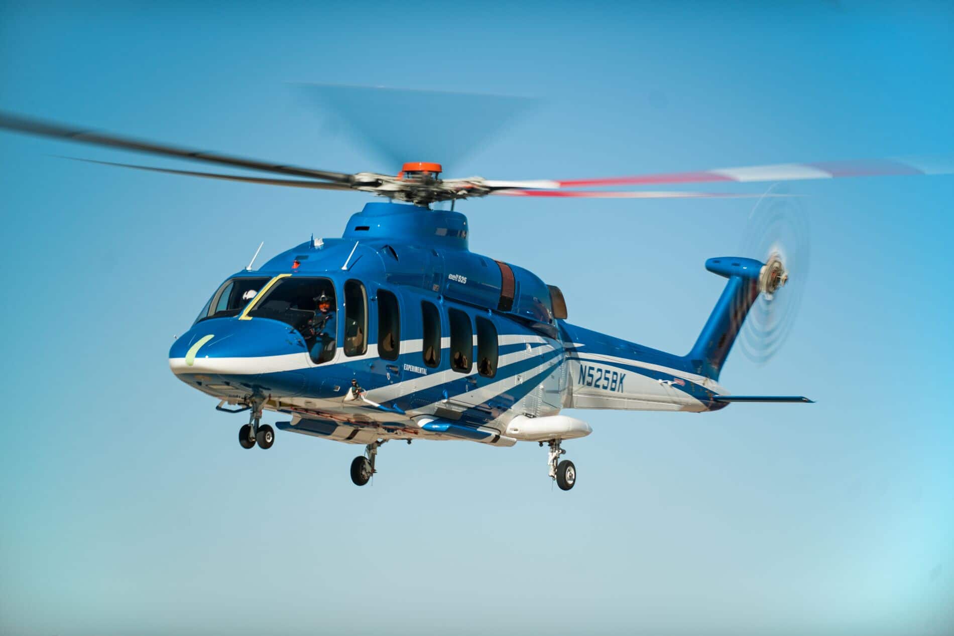 Bell 525 Airborne in Front a Blue Sky